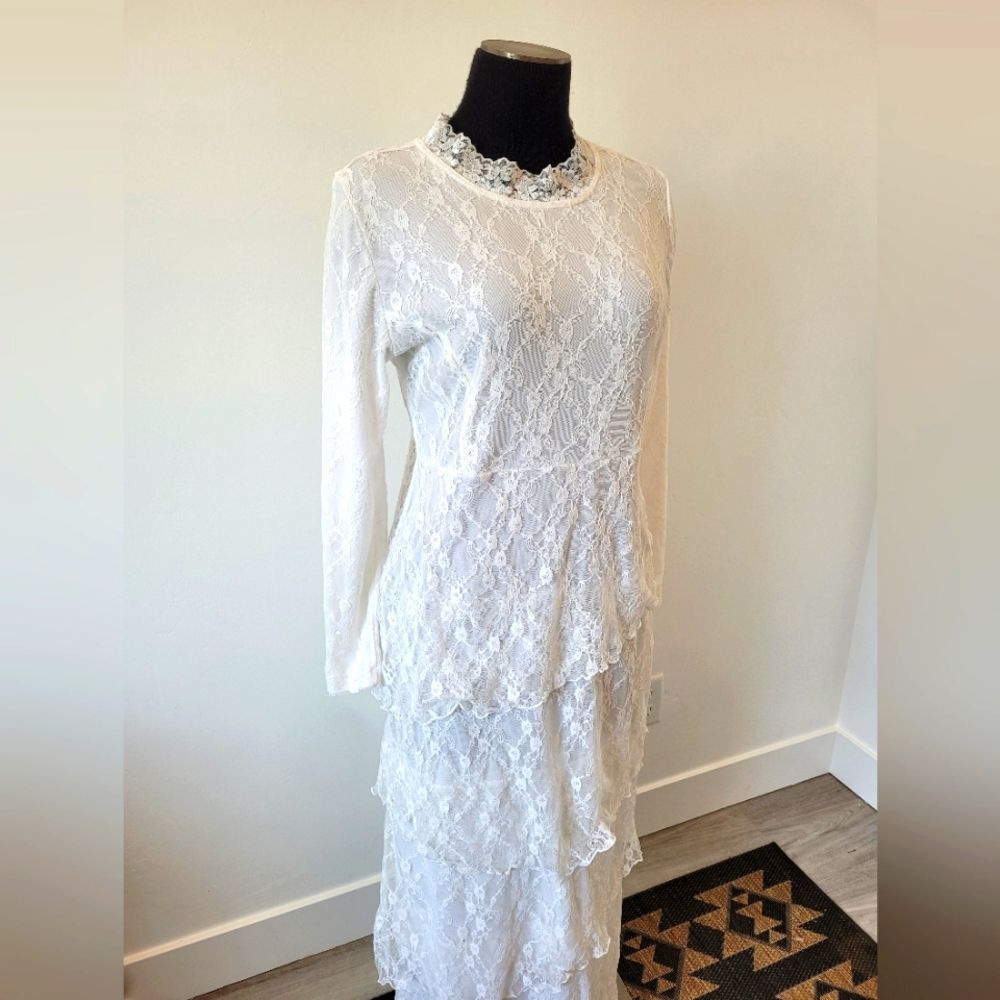 Timeless handmade white lace wedding dress 🤍